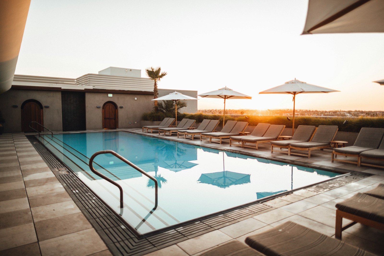 Pool deck and terrace at sunset